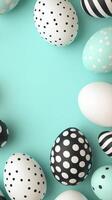 Creative decorated eggs on a turquoise background with various patterns and colors for Easter photo