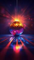A vibrant disco ball reflecting colorful light patterns at a lively dance party venue photo