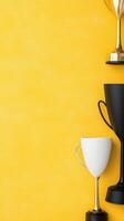 Trophy collection on yellow background displaying achievements in various competitions and events photo