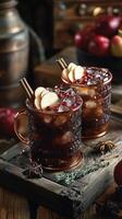 Refreshing fall beverages with apples and pomegranate, served in rustic mugs on a wooden tray photo
