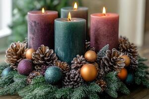 Four burning advent candles with christmas decoration creating cozy festive atmosphere photo