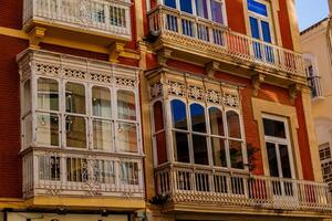 A building with many balconies and windows photo