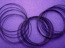 Dark purple circle wire pattern for abstract mysterious background. photo