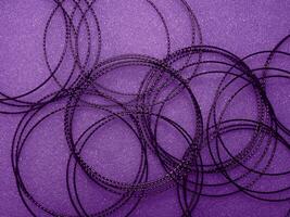 Dark purple circle wire pattern for abstract mysterious background. photo