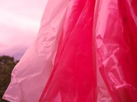 Pink plastic texture for a colorful background. photo
