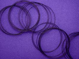 Dark purple circle wire pattern for abstract mysterious background. photo