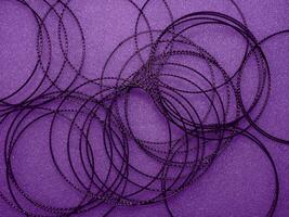 Dark purple circle wire pattern for abstract mysterious background. photo
