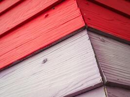 Red fake wood texture for a minimalist background. photo