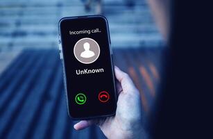 Smartphone incoming call notification. concept of scammers or strangers, fraud, and contact to sell mobile internet promotions photo