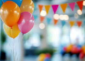 A bunch of colorful balloons in a modern office space with blurred triangle flag background. photo