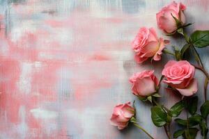 pink roses on light pink denim background, flat lay style. The rose bouquet is placed at the bottom left corner and has an empty space to add text photo