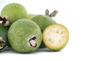 Fresh Feijoa Fruits Displayed on White Background photo