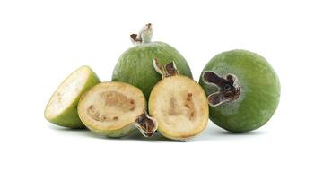 Fresh Ripe Feijoas Displayed on White Background for Healthy Eating photo