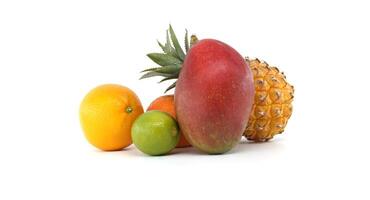 Assortment of Fresh Tropical Fruits on White Background photo