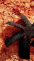 A metallic object on a vibrant red background video