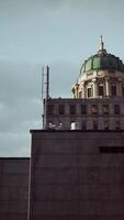 A tall building with a dome on top of it video