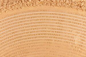 Beautiful texture of dry loose powder in a natural tone. cosmetic abstract background for design. top view. A copy space. layout. photo