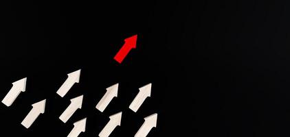 Business growth concept of Red Arrows pointing upward,uniqueness thinking, pointing upward,arrow up with different way photo