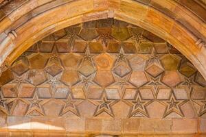 Carved stone decorations and patterns of the Great Mosque of Divrigi photo