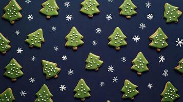 Christmas gingerbread cookies in the form of a Christmas tree on blue background. photo