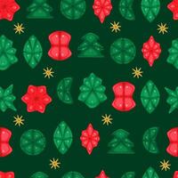 Seamless pattern with Christmas tinsel elements on a green background vector