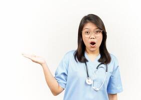 Presenting and Showing Product on Open Palm Of Asian Young Doctor Isolated On White Background photo