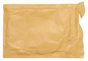 Rectangular envelope made of brown paper on isolated background photo
