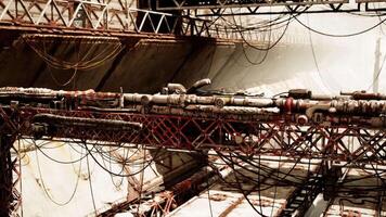 Abandoned oil terminal with crumbling infrastructure and debris video