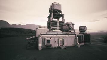 Colonist base established on a distant planet with rugged terrain in twilight video