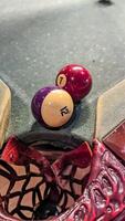 Billiard balls in front of a pocket. American billiards. Close-up. photo