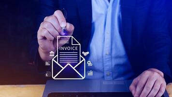 Invoice and online digital statements concept, using touch with invoice icons on virtual screen, Financial report and bank management with online payment concept E.invoice invoice. photo