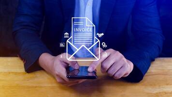 Invoice and online digital statements concept, using touch with invoice icons on virtual screen, Financial report and bank management with online payment concept E.invoice invoice. photo