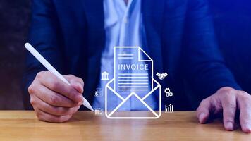 Invoice and online digital statements concept, using touch with invoice icons on virtual screen, Financial report and bank management with online payment concept E.invoice invoice. photo