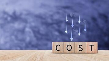 Cost reduction concept on wooden cube, Expenses and saving money, Business strategy and project management, cost reduction, efficient business and budget cutting. photo