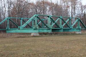 A bridge deck with large beams, on dry land. photo
