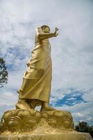 Statue of Buddha in sky background. Giant Buddha Statue. photo
