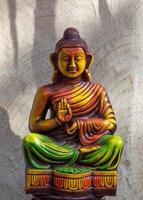 Statue of Buddha on abstract background photo