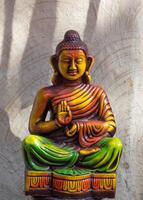 Statue of Buddha on abstract background photo