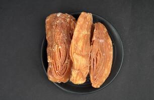 Top view of Special Khaja of Puri in black background photo