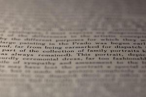 macro photography of a book page with text in English font photo