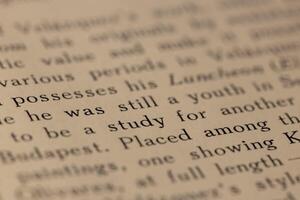 macro photography of a book page with text in English font photo