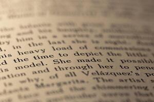 macro photography of a book page with text in English font photo