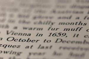 macro photography of a book page with text in English font photo