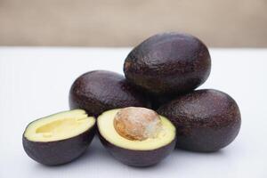 Fresh avocado fruits. Concept, Healthy food. Avocados are high- good fat fruit that are considered a super food because of its great health benefits, also export agriculture crops. photo