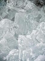 icecubes background,icecubes texture,icecubes wallpaper,ice helps to feel refreshed and cool water from the icecubes helps the water refresh your life and feel good.ice drinks for refreshment business photo