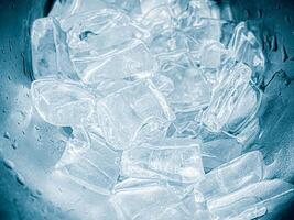 icecubes background,icecubes texture,icecubes wallpaper,ice helps to feel refreshed and cool water from the icecubes helps the water refresh your life and feel good.ice drinks for refreshment business photo