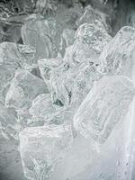 icecubes background,icecubes texture,icecubes wallpaper,ice helps to feel refreshed and cool water from the icecubes helps the water refresh your life and feel good.ice drinks for refreshment business photo