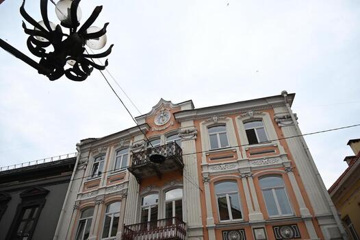 a building with a clock on it photo