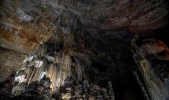Stunning rock formations illuminated in Cacahuamilpa Caves National Park at sunset photo