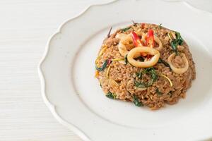 fried rice with squid and basil in Thai style photo